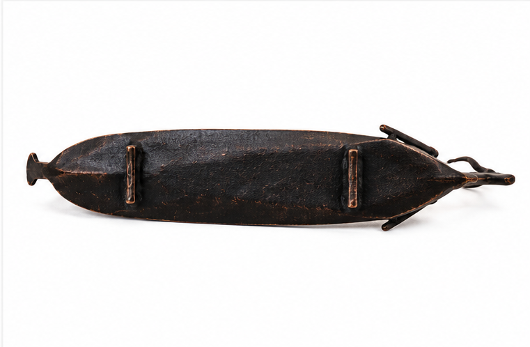Tribal group with boat figurine