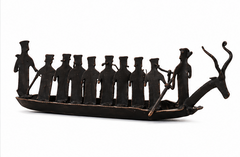 Tribal group with boat figurine
