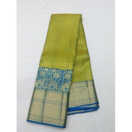Handwoven Mulberry Silk Dharmavaram Handloom Pattu Sarees In Peacock Green Colour With Ornate Border