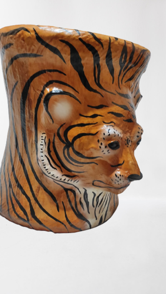 The tiger face design brings a sense of wild and exotic aesthetics to the stool, making it a bold and eye-catching addition to your interior decor. The tiger face design brings a sense of wild and exo