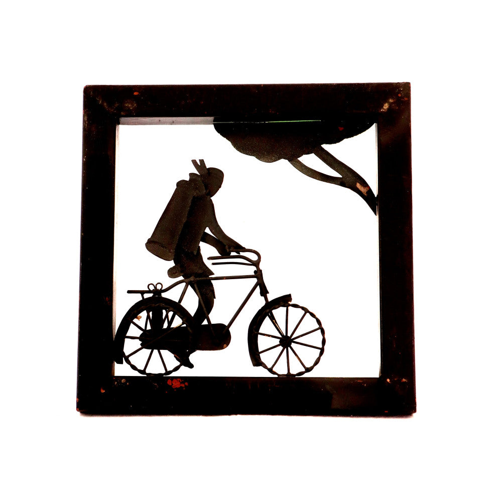 Maadia riding bicycle wall hanging