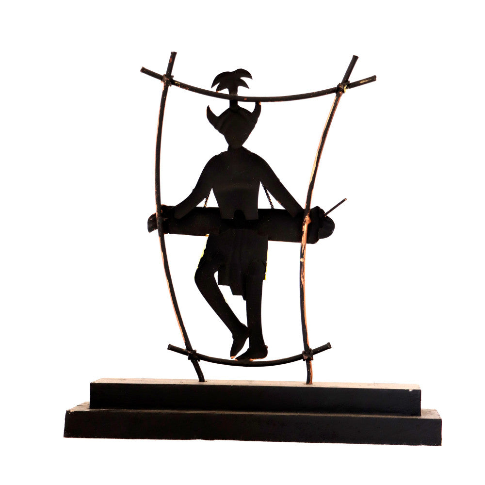 Maadia with instruments inside bamboo frame figurine