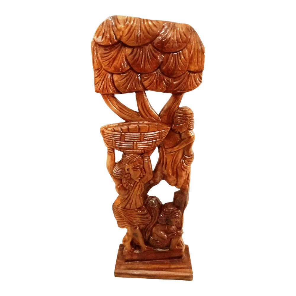 Madini Standing under the Tree shad along with the Kids Climbing the GTree Wooden Craft