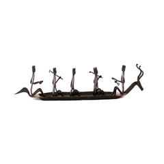 Tribal group on boat with Deer head
