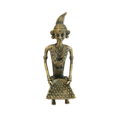Tribal Woman holding a Pan in her Hand