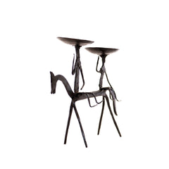 Two tribal men riding on horse candle stand